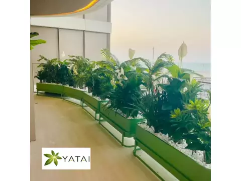 artificial-tropical-plant-arrangement-in-modern-planters-yatai
